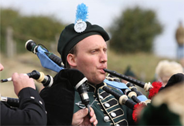 James playing bagpipes
